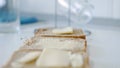 Morning Breakfast with Butter on the Toast, Spreading Margarine on a Fresh Slice of Bread in the Kitchen Royalty Free Stock Photo