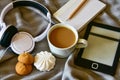 Morning breakfast coffee with marshmallows, headphones, notebook with pencil, e-book, on a cozy plaid Royalty Free Stock Photo