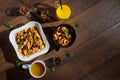 Morning breakfast, corn flakes, raisins, almonds, orange juice, top view, on a dark wooden background, flat lay. The concept of Royalty Free Stock Photo