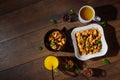 Morning breakfast, corn flakes, raisins, almonds, orange juice, top view, on a dark wooden background, flat lay. The concept of Royalty Free Stock Photo