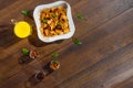 Morning breakfast, corn flakes, raisins, almonds, orange juice, top view, on a dark wooden background, flat lay. The concept of Royalty Free Stock Photo