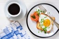Morning breakfast: egg, toast, salmon and a cup of coffee Royalty Free Stock Photo