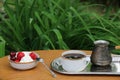 Morning Breakfast with ice cream and coffee in nature.