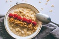 Morning breakfast, oatmeal in milk with berries