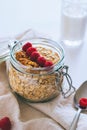 Morning breakfast, oatmeal with red raspberries and walnuts Royalty Free Stock Photo