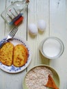 morning breakfast of oatmeal, toast, two eggs and sour cream