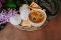 Morning breakfast. Spring flowers, platter with coffee cup and sweets. Royalty Free Stock Photo