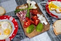 Morning breakfast for two people top view fried eggs tomato avocado ham cheese white bread Royalty Free Stock Photo