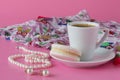 Morning brearfast on table with bijouterie and coffee cup