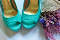 Morning of the bride. Wedding accessories and turquoise shoes