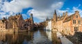 Morning Bruges, Belgium. Panoramic Image In Realistic Color with Rozenhoedkaai in Brugge,Dijver river canal with Belfort / Belfry Royalty Free Stock Photo