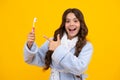 Morning brushing teeth. Dental care, hygiene and child. Teenage girl with toothbrush brushing teeth. Shocked surprised Royalty Free Stock Photo