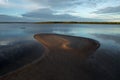 Morning calm river and the sand alluvium. Royalty Free Stock Photo