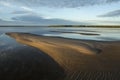 Morning calm river and the sand alluvium. Royalty Free Stock Photo