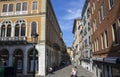 Morning city scene of Venice street with colorful buildings