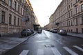 Morning city. Wet asphalt. Empty street, cars along the road Royalty Free Stock Photo