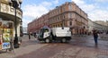 Morning cleaning on Arbat street in Moscow with a sweeping car