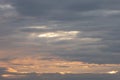 Morning clouds with the sun shining and two birds. Royalty Free Stock Photo