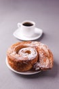 Morning coffee and biscuit - high-calorie breakfast, unhealthy food, modern bad habits, caffeine and fast carbohydrates.