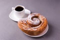 Morning coffee and biscuit - high-calorie breakfast, unhealthy food, modern bad habits, caffeine and fast carbohydrates.