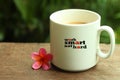 Morning Coffee concept. Work inspirational quote on a mug - Work smart not hard. With white mug of coffee and self notes reminder Royalty Free Stock Photo