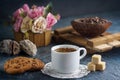 Morning coffee with cookies and pieces of cane sugar, coffee beans and dried fruits