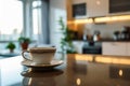 Morning Coffee Cup on Kitchen Counter With Blurry Modern Interior in the Background