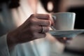 Morning coffee in hands of woman in robe Royalty Free Stock Photo