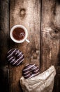 Morning - Coffee and homemade donuts filled with chocolate Royalty Free Stock Photo