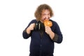 Morning coffee, lunch. Funny fat man with a mug and a bun. Breakfast is hot bun and coffee Royalty Free Stock Photo