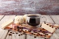 Morning coffee with a sweet dessert, cranberry marshmallow and vanilla marshmallow. Royalty Free Stock Photo
