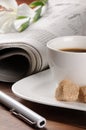 Morning coffee time with newspaper