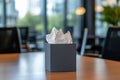 In the morning, a conference room with soft lighting features a tissue box on a wooden table Royalty Free Stock Photo
