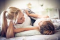 Morning conversation on bed. Mother and daughter. Royalty Free Stock Photo