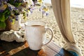 Morning cup of coffee on the beach Royalty Free Stock Photo