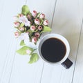 Morning Cup of coffee and a beautiful flowers Royalty Free Stock Photo