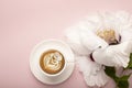 Morning Cup of coffee and a beautiful roses flowers on light background, top view. Cozy Breakfast. Flat lay style Royalty Free Stock Photo