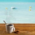 Morning cup of coffee by warm caribbean sea Royalty Free Stock Photo