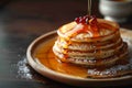 Morning delight Pancakes drizzled with honey on wooden surface