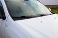 Morning dew on the window of a white car Royalty Free Stock Photo