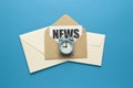 Morning e-mail newsletter. Envelopes and clock on blue background