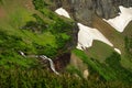 Morning Eagle Falls Drops Off Clff Edge Below Piegan Pass Royalty Free Stock Photo