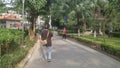 Shenzhen, China: elderly men walk for physical rehabilitation training