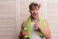 Morning exercises and healthy lifestyle concept. Man with water bottle Royalty Free Stock Photo