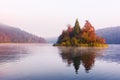 Morning fog on amazing island on Plitvice lakes