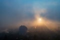 Morning fog city rays sun Royalty Free Stock Photo