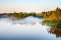 Morning fog at the forest lake in Karelia Royalty Free Stock Photo