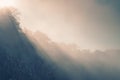 Morning fog in the mountains at sunrise. Clouds over the rocks and trees Royalty Free Stock Photo