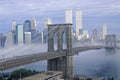 Morning fog over the Brooklyn Bridge looking into Manhattan, NY Royalty Free Stock Photo