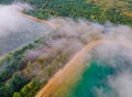 Morning fog over the lake aerial view of mist fog landscape in the forest Royalty Free Stock Photo